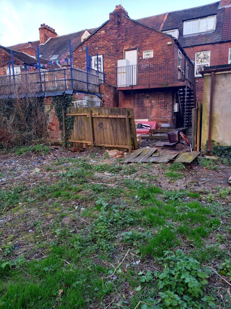 The back of the Princes Avenue shops after some rubbish has been removed